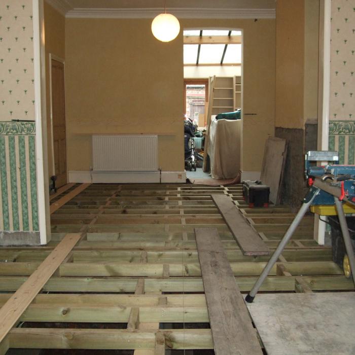Replacement pre-treated floor joists sat upon newly constructed sub-floor foundation walls, just awaiting secretly nailed finished flooring. A job well done.&nbsp;